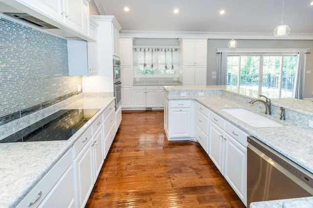 kitchen featuring dark wood-type flooring, stainless steel appliances, sink, and white cabinetry