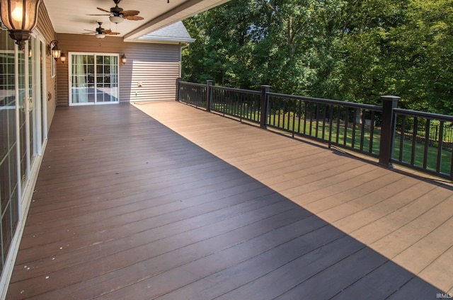 wooden deck with ceiling fan