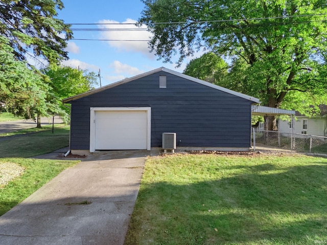 garage with a lawn