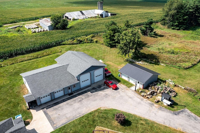 birds eye view of property featuring a rural view