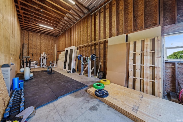 miscellaneous room with a towering ceiling