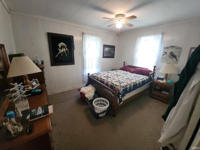 bedroom featuring crown molding, multiple windows, ceiling fan, and carpet