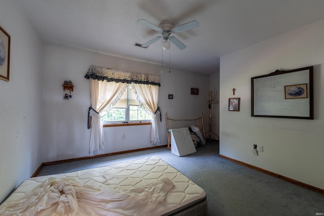 unfurnished bedroom with ceiling fan and carpet flooring