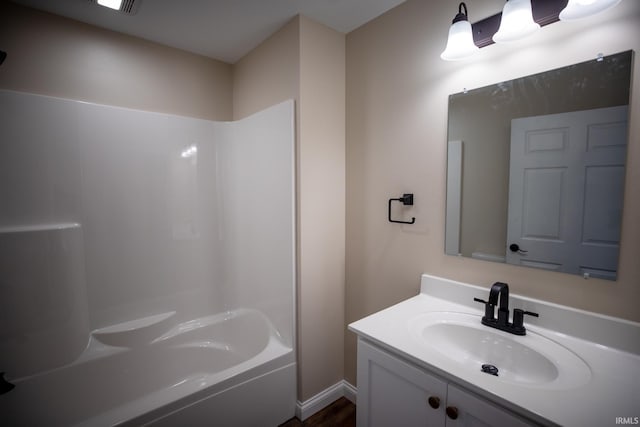114 Meadow Ct, Argos, IN 46501 - full bathroom featuring vanity and shower / tub combination