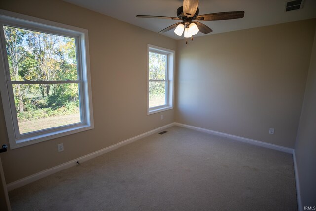 114 Meadow Ct, Argos, IN 46501 - carpeted empty room featuring ceiling fan and baseboards