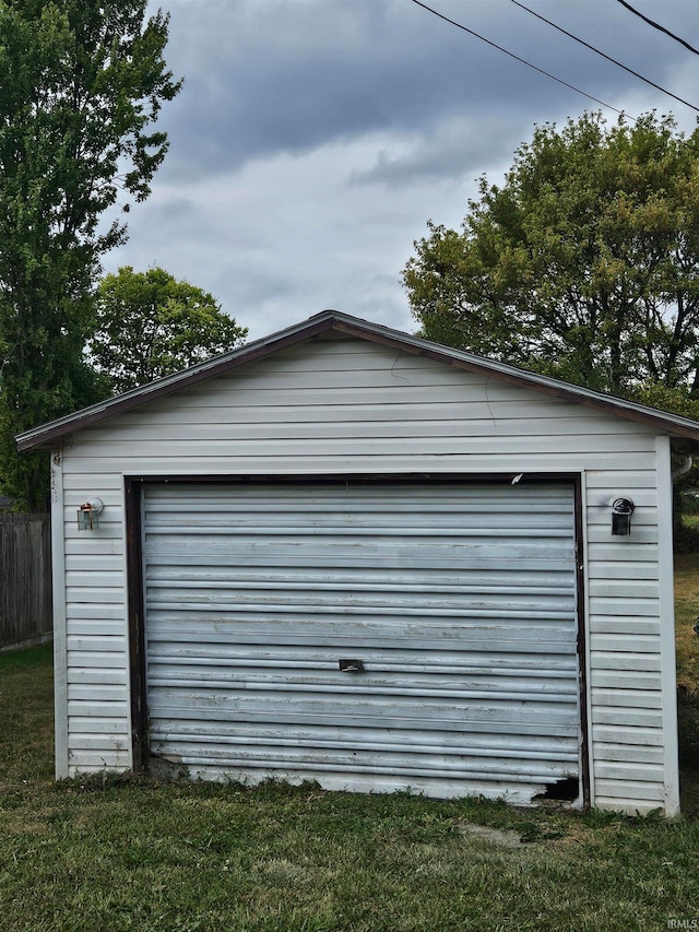 garage featuring a yard