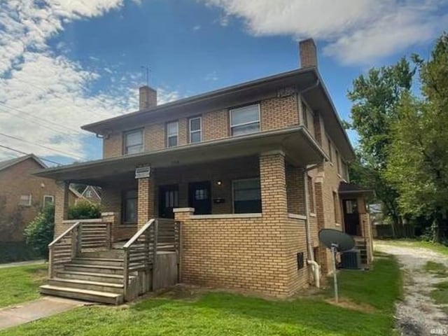 exterior space featuring a front lawn