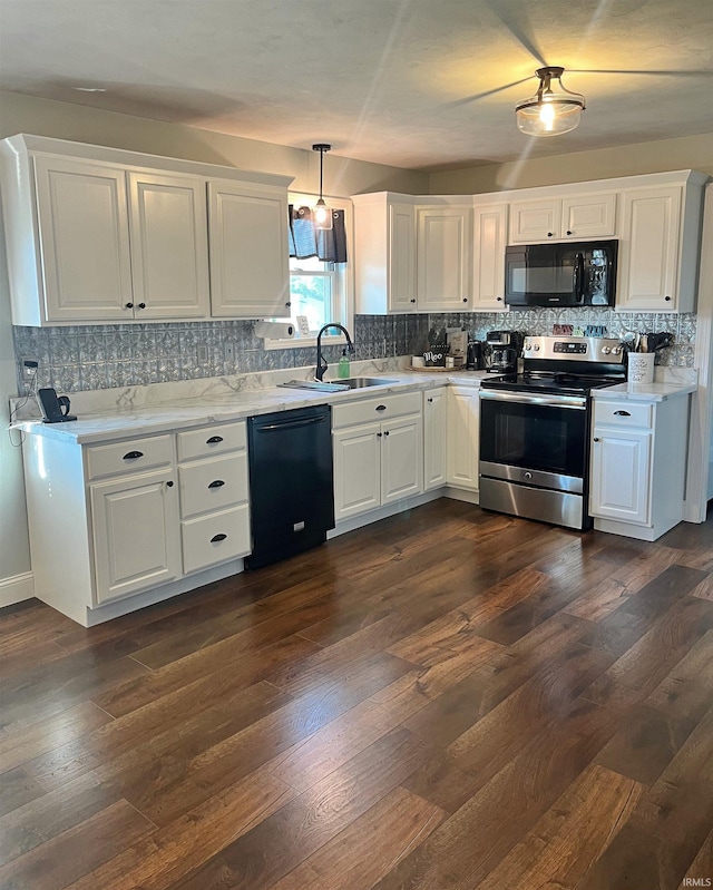 kitchen with black appliances, dark hardwood / wood-style floors, sink, and white cabinets