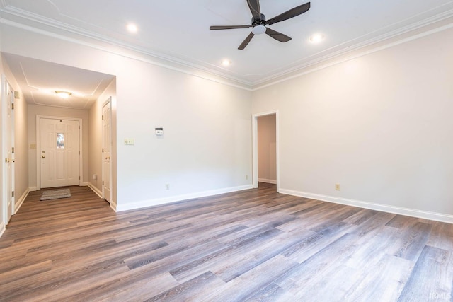 empty room with ceiling fan, light hardwood / wood-style floors, and crown molding