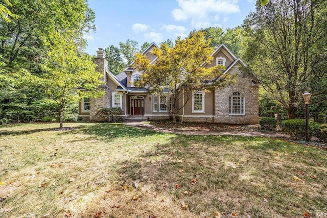 view of front of home featuring a front lawn