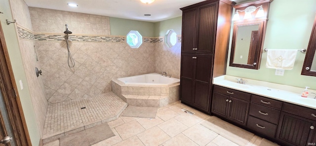 bathroom featuring vanity, separate shower and tub, and tile patterned floors