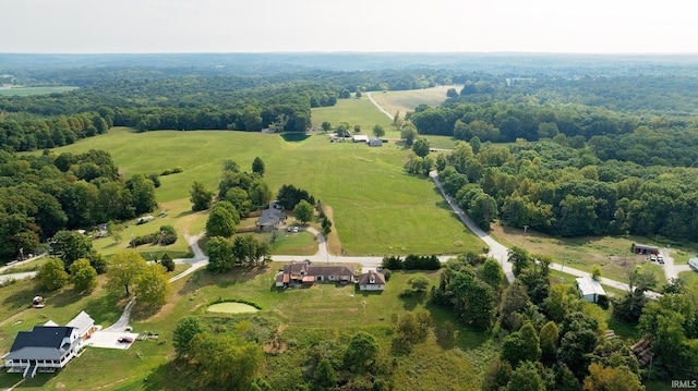 birds eye view of property featuring a rural view