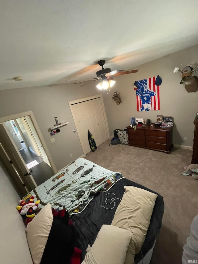 carpeted bedroom featuring ceiling fan