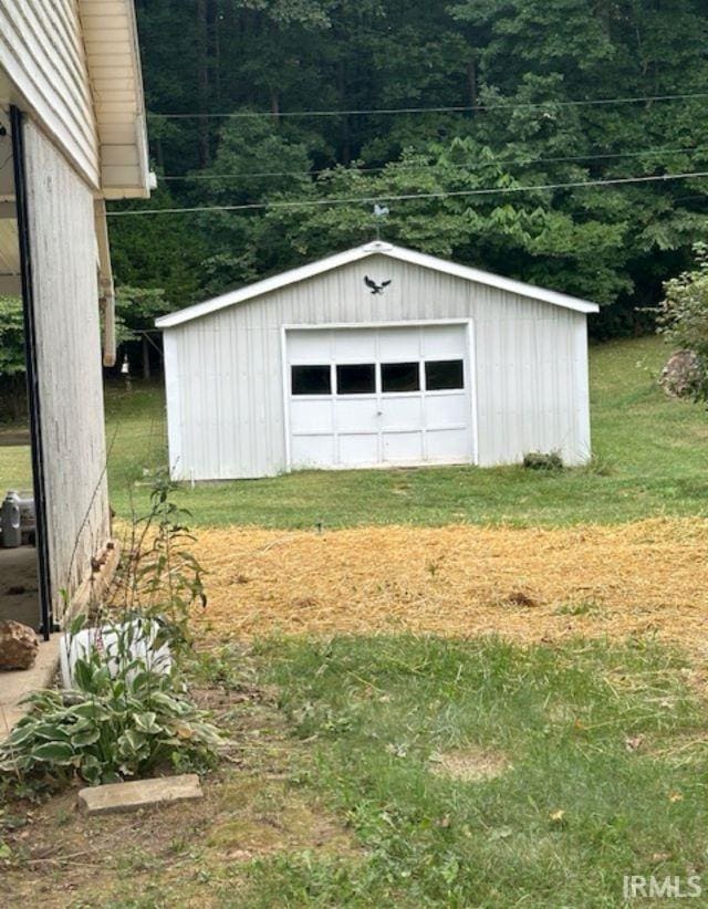 view of outbuilding featuring a garage