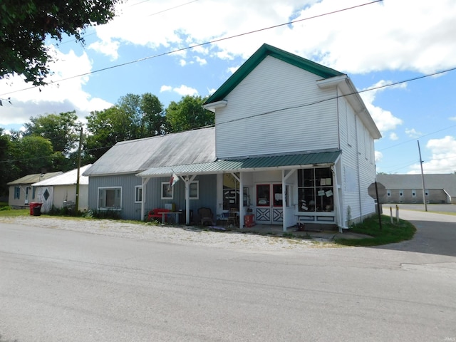 view of front of home featuring covered porch