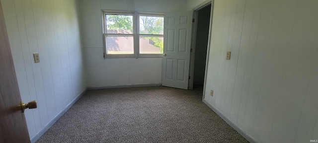 unfurnished room featuring carpet floors