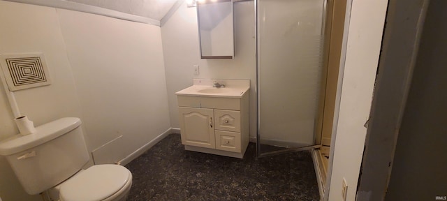 bathroom featuring vanity, toilet, and walk in shower