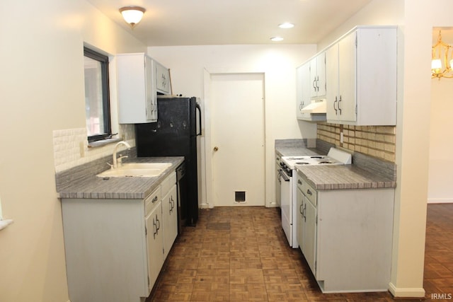 kitchen featuring white range with electric stovetop, sink, backsplash, and white cabinetry