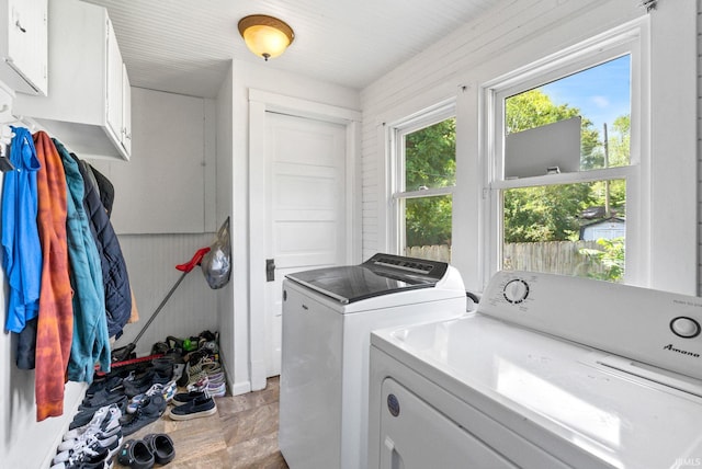 laundry room with washing machine and clothes dryer