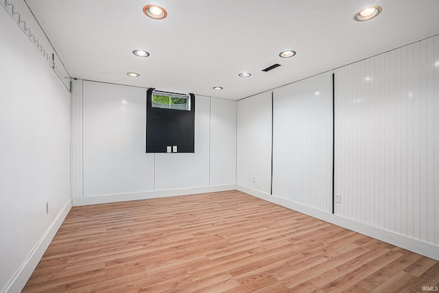 empty room with light wood-type flooring