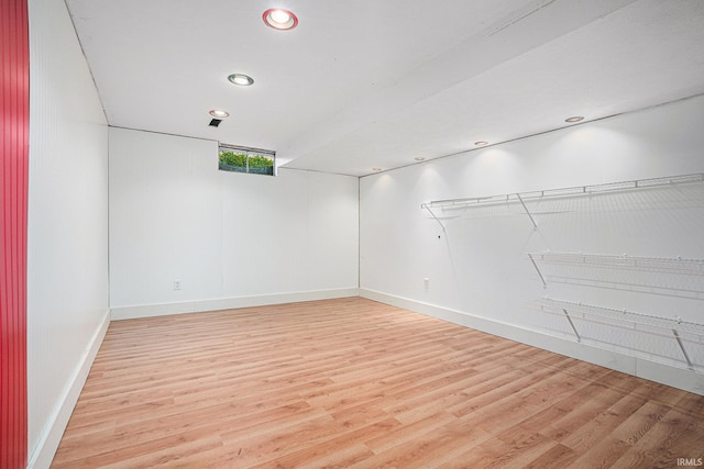 empty room with light wood-type flooring