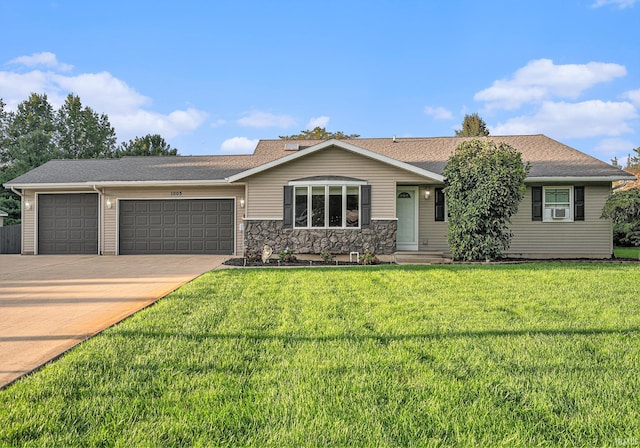 ranch-style house featuring cooling unit, a front lawn, and a garage