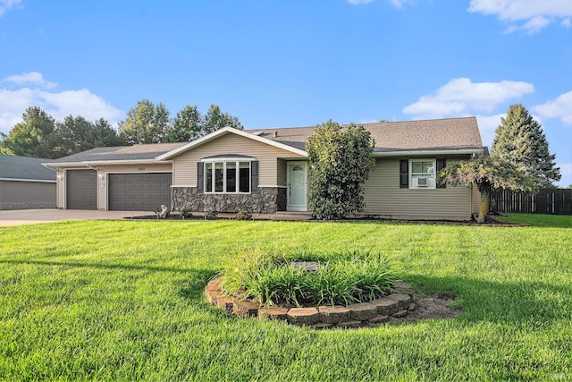 ranch-style home with a front yard and a garage