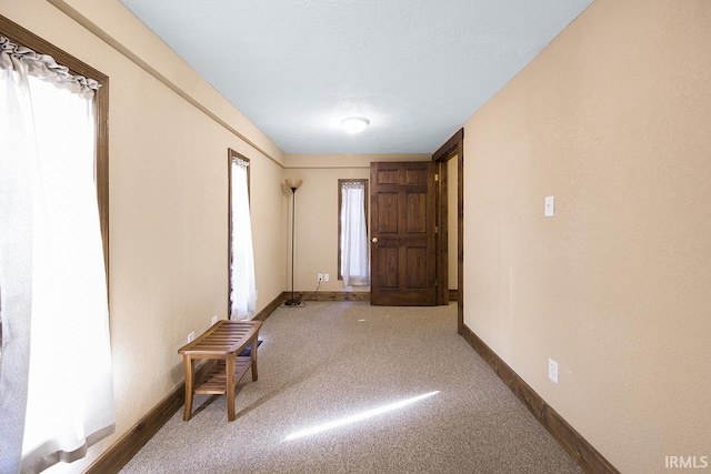 632 W Main St, Peru, IN 46970 - entrance foyer featuring baseboards and carpet