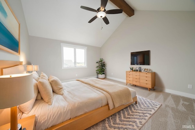 bedroom featuring ceiling fan, carpet floors, and lofted ceiling with beams