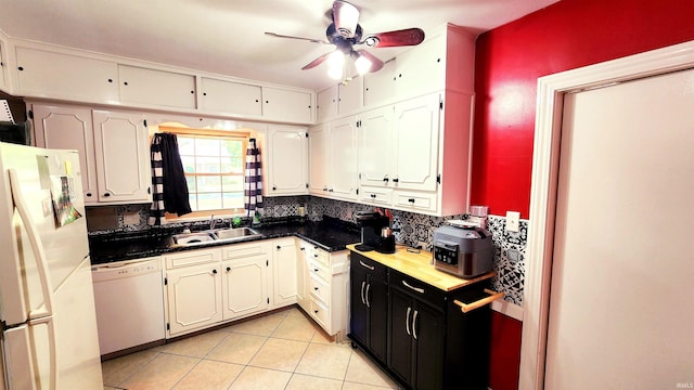 kitchen with white appliances, sink, decorative backsplash, ceiling fan, and light tile patterned flooring