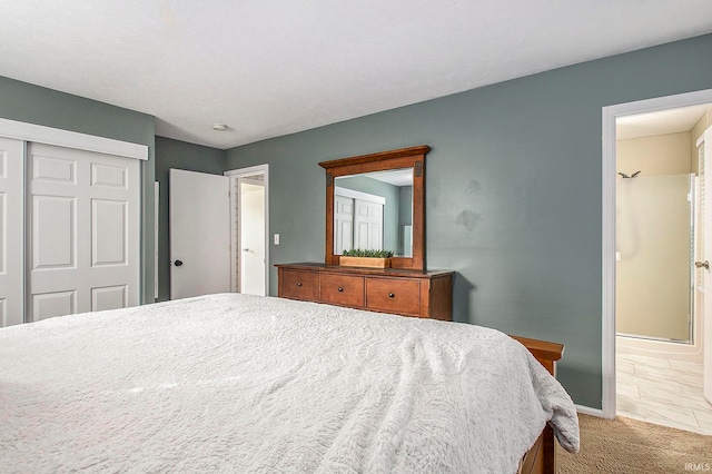 carpeted bedroom with a closet