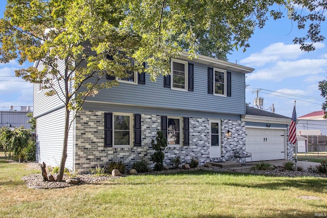 view of front of property with a front yard and a garage