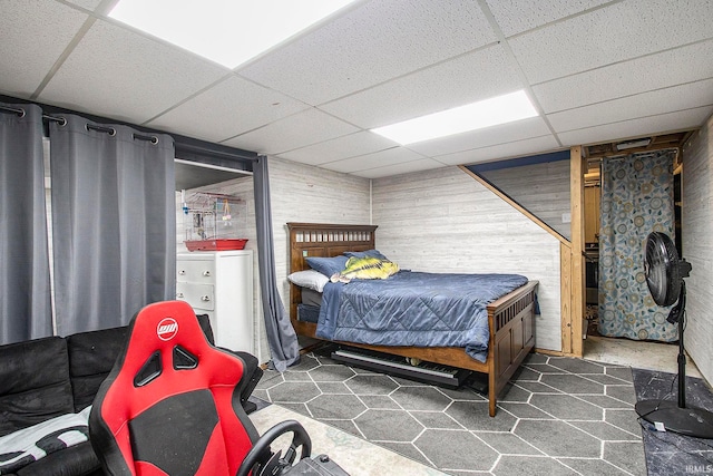 bedroom with a paneled ceiling