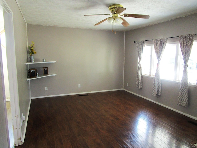 unfurnished room featuring a textured ceiling, ceiling fan, and wood-type flooring