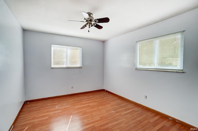 unfurnished room with ceiling fan and light hardwood / wood-style floors