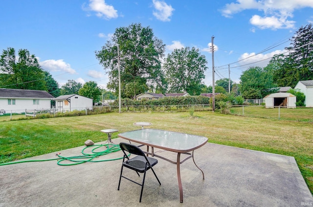 view of patio / terrace featuring a storage shed