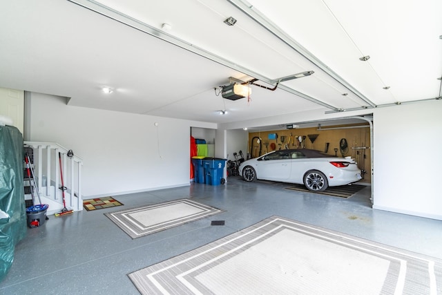 garage featuring a garage door opener