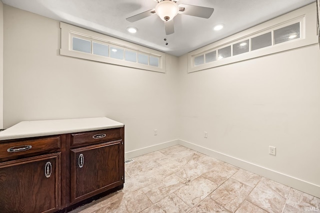 unfurnished room featuring ceiling fan