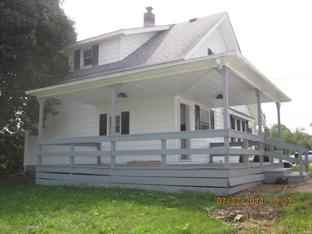 view of home's exterior featuring covered porch