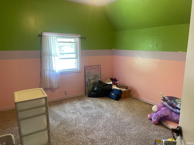 bonus room featuring lofted ceiling and carpet