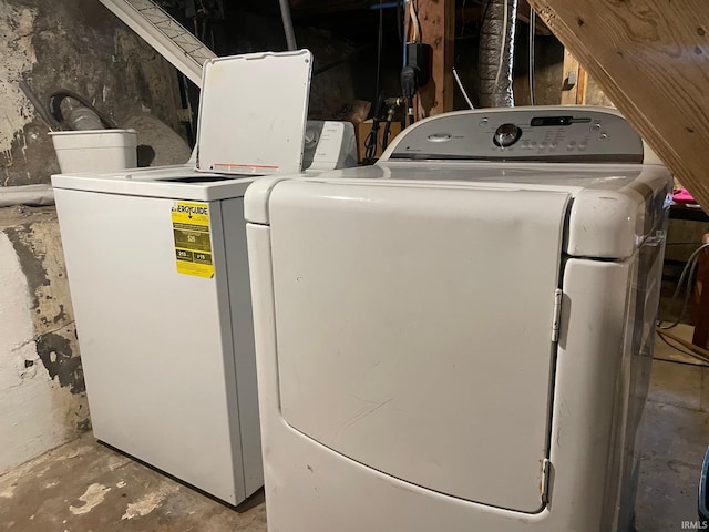 laundry area with washing machine and dryer