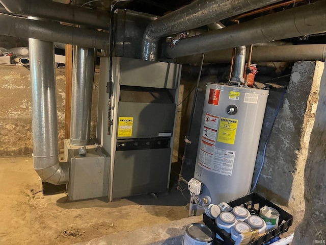 utility room featuring water heater