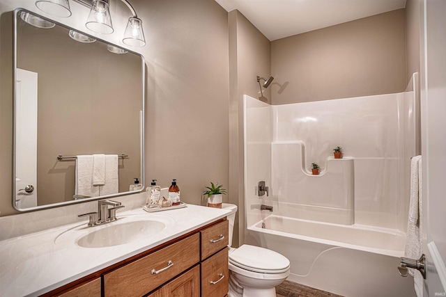 full bathroom featuring vanity, toilet, and bathtub / shower combination