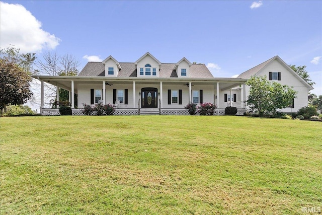 view of front facade featuring a front yard and a porch