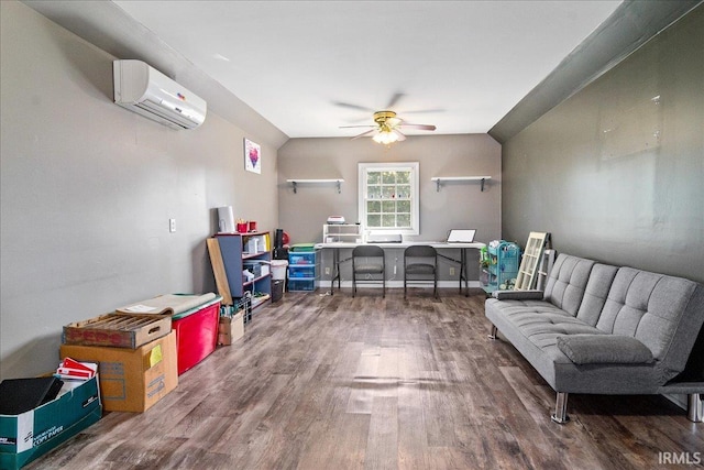 interior space with dark hardwood / wood-style flooring, a wall unit AC, and ceiling fan