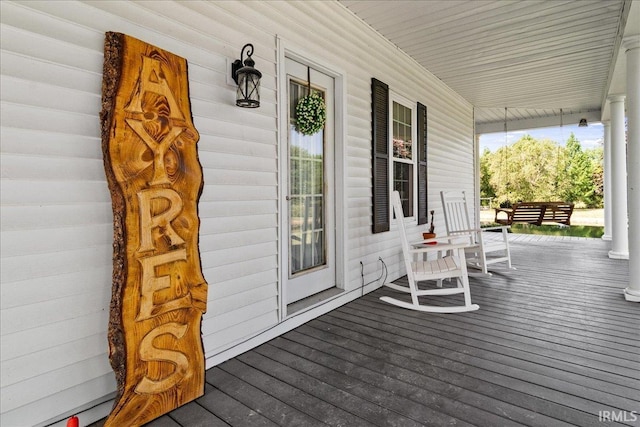 deck with covered porch