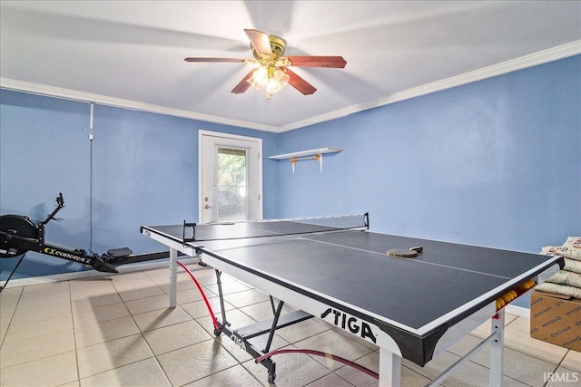 recreation room with ceiling fan and ornamental molding