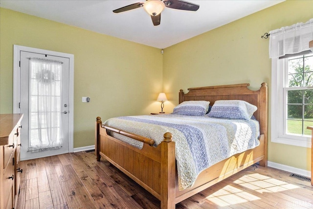 bedroom featuring hardwood / wood-style floors and ceiling fan