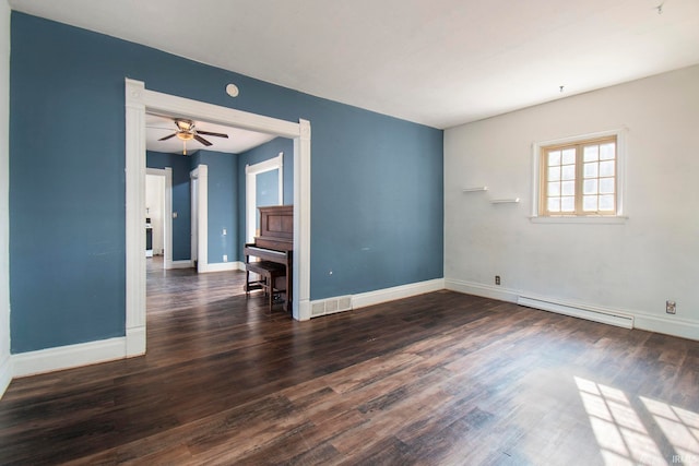 empty room featuring a baseboard radiator, ceiling fan, and dark hardwood / wood-style floors