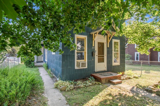 doorway to property with cooling unit